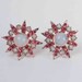Coro Starburst Atomic Earrings.
