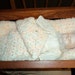 Small doll in hand-made cradle SALE