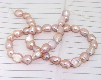 One Full Strand-----Luster Lavender Rice Pure Freshwater Pearl----8mm-10mm----about 38Pieces----15inch strand