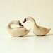 A Pair of Snowy White Porcelain Swans
