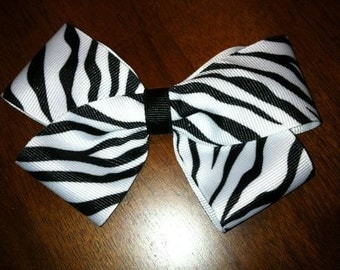 Items similar to MEDIUM FUNKY LAYERED ZEBRA HAIR BOW on Etsy