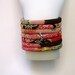 Chirimen Cord Yoga Wrap Bracelet or Anklet in Reds and Pinks with Pewter Bead