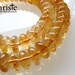 Citrine smooth button 5x10mm 1/2 strand (7 inch)