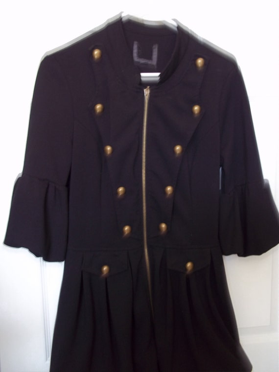 Ladies black military style jacket with bubble skirt and sleeves and
