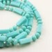 1980s Very Long Turquoise Rectangle and Disc Beaded Necklace