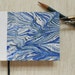 Small Hand made blank book with white leather spine. Blue