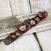Leather flower bracelet with leather flowers in silver and red