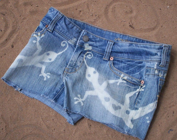 Hand bleached denim shorts with gecko design by reMusedClothing