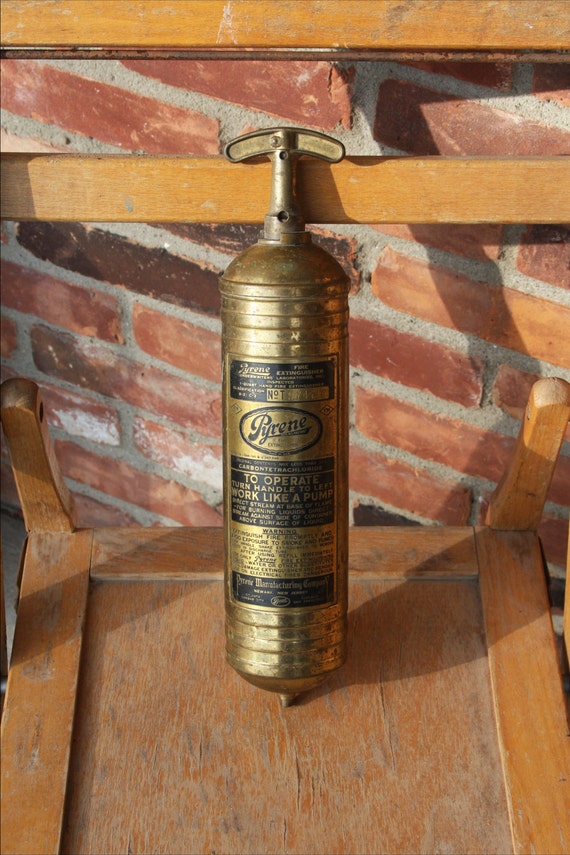 Antique Pyrene brass fire extinguisher