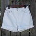 White denim high waisted shorts / white cut offs / high rise / frayed hem / cuffed / 28" waist / Made in USA