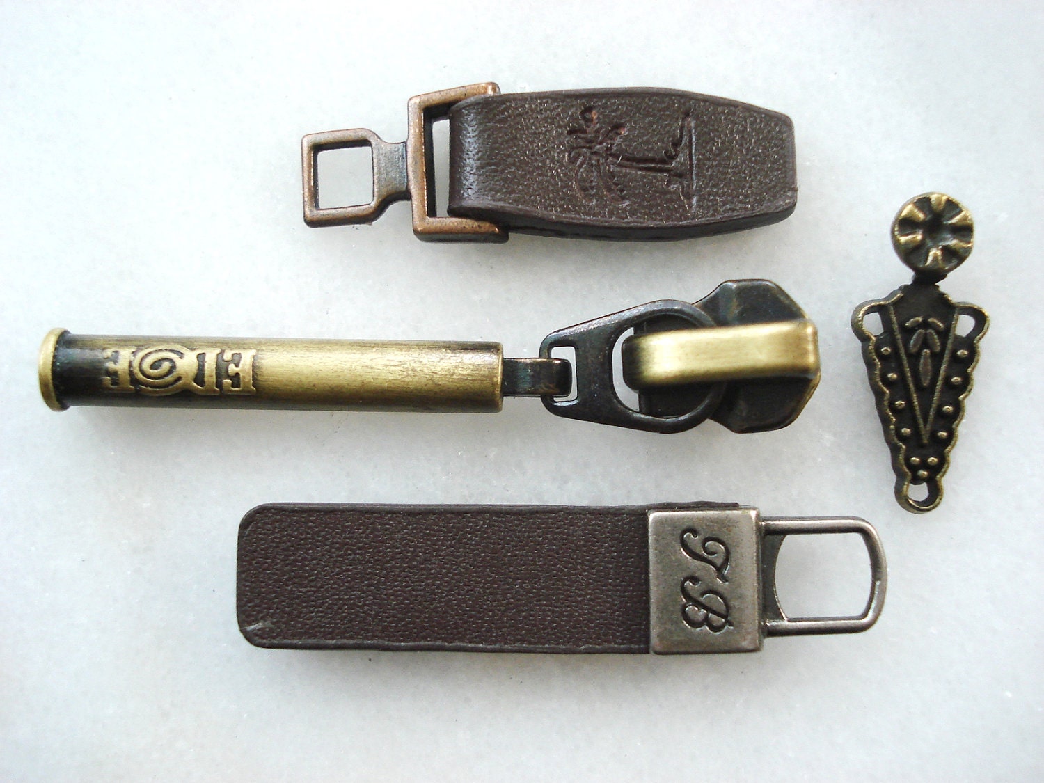 zipper pulls zipper pulls