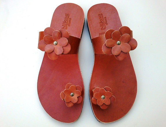 Brown Leather Sandals decorated with leather flowers.