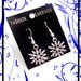 Gorgeous Snow Flake Earrings- goth- bridal- silver tone- steampunk- fantasy- metal- earrings- punk- cute- winter