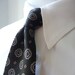 Vintage Brooks Brothers All Silk Small Medallions on a Black Background Repp Trad / Ivy Tie. Made in USA.