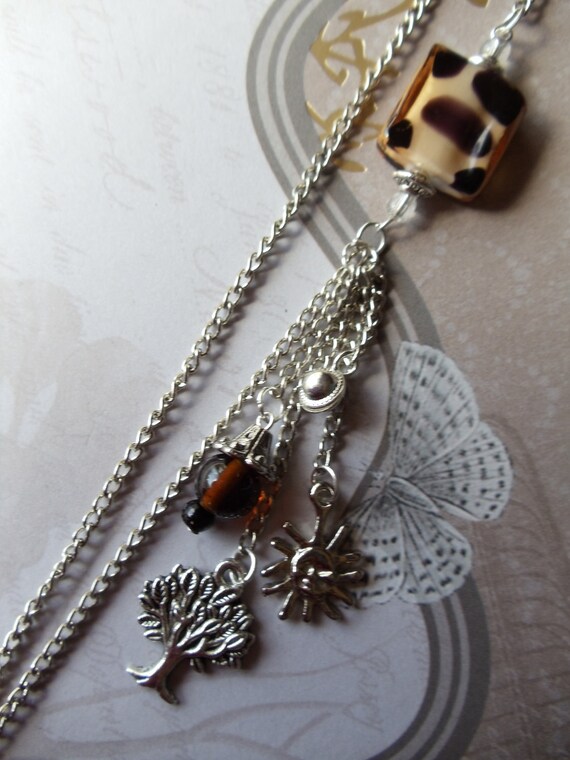 Leopard watch pendant in silver tone with matching glass