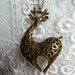 Giraffe necklace antique bronze giraffe with heart shaped body and glass beads on 26" chain.