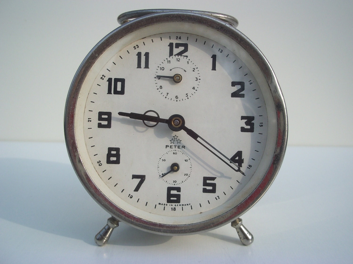 Vintage alarm clock.Retro home decor.Made in Germany by Peter.