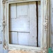 White ivory ornate frame gold accents 37 by 31 distressed shabby chic Anita Spero