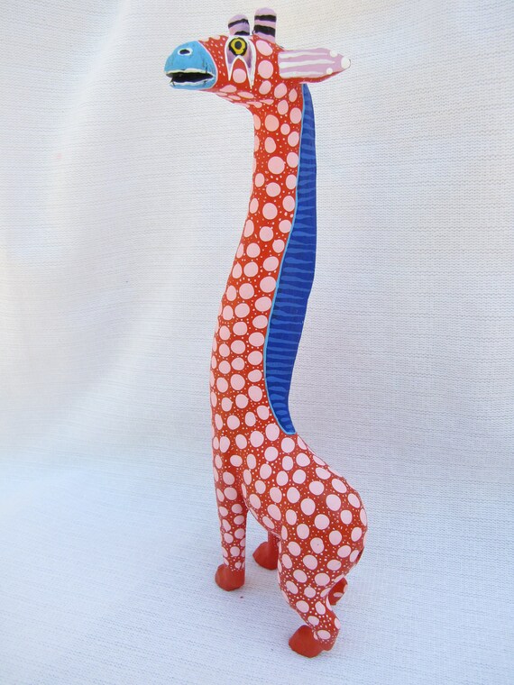 brightly painted wooden giraffe by saularagon on Etsy
