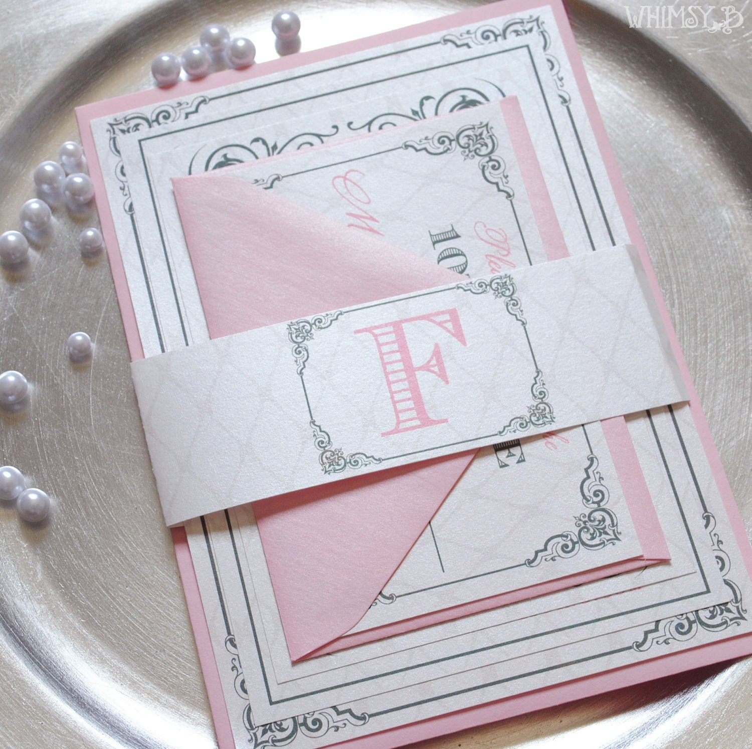 Wedding invitations in pink and silver