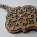 RESERVED - 20% Sale - Tile In Translation - Pierced and Riveted Brass and Copper Pendant