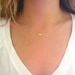 Tiny Skull Necklace - Matte 14k Gold Plated Skull Charm on Gold & White Delicate Chain with Mint Faceted Bead - Boho Jewelry