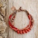 Red coral and copper lotus charm yoga bracelet