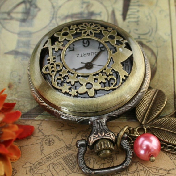 Items similar to Antique bronze pocket watch necklace with rabbit