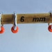 Medium Snag Free Stitch Markers - Silver & Orange - Set of 7
