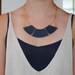 Navy leather semicircle bib necklace