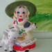 Mary Belle bell figurine.