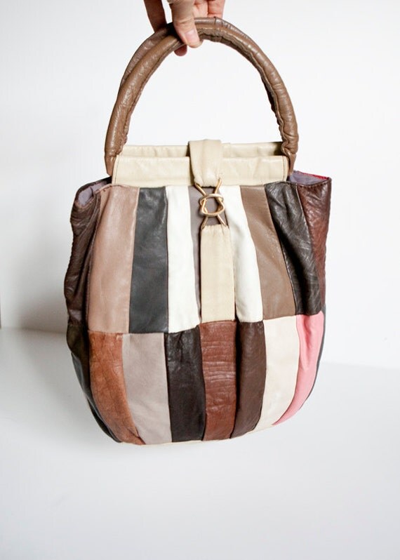 Items similar to Vintage Patched Leather Bag on Etsy