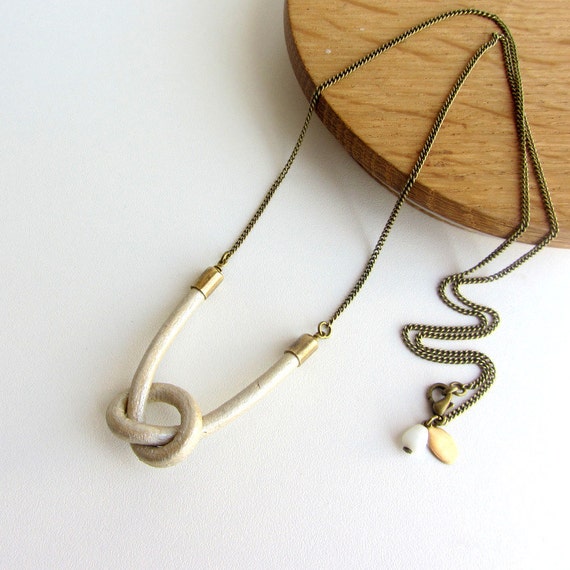 Items similar to White pearl leather knot long necklace, antique brass ...