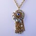 1950s tassel necklace with Swarovski crystals, aurora borealis and gold tone chains