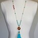 Tibetan bead, deep blue Amazonite, Swarovski crystal faceted dark red coral & turquoise tassel gold necklace