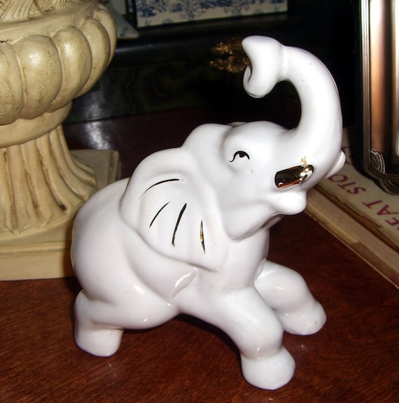 white porcelain elephant figurine