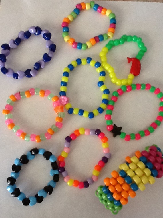 Items similar to 8 kandi bracelets, one small cuff, plus a surprise ...