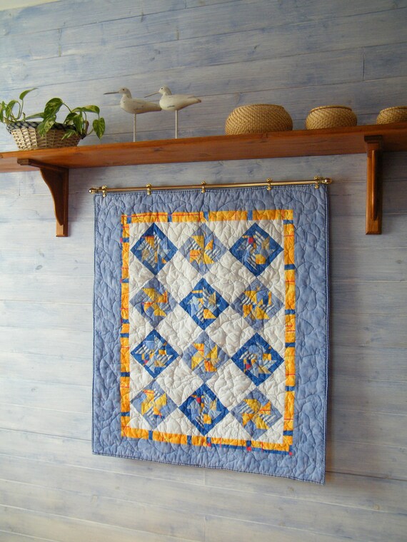 Items similar to Baby quilt, crib quilt or wall hanging 'Windmills' on Etsy