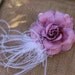 Very cuter flower with feather and beads