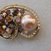 Beautiful brown color brooch with sparkling rhinestones and 1 pearl