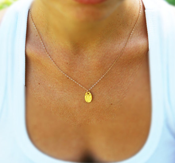 Gold necklace oval pendant textured gold disc necklace