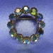 Vintage Jewelry Aurora Borealus Stones on Circle Brooch