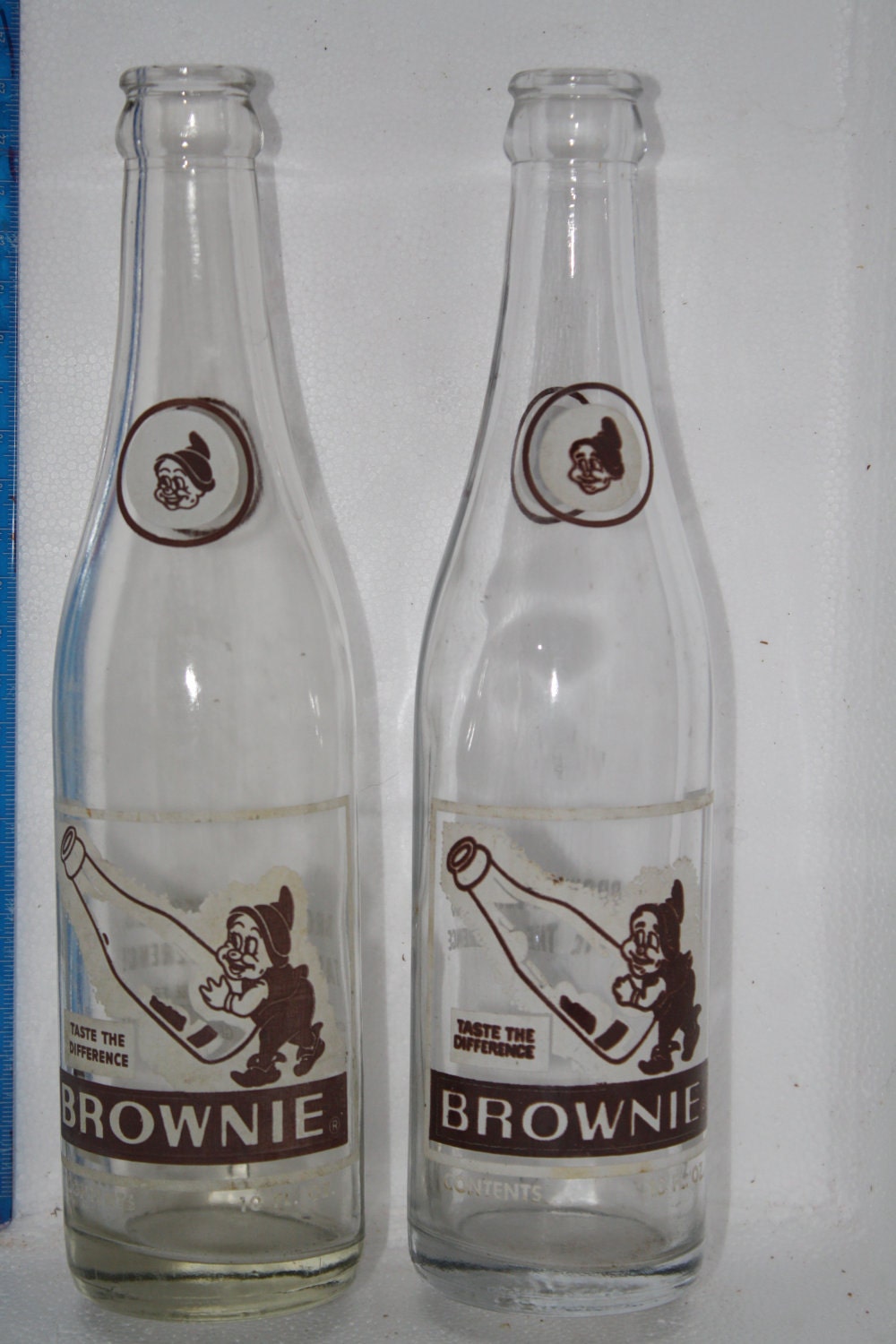 set of antique 10 ounce Collectible Brownie Soda bottles