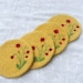 Yellow Wool Felted Coasters with a needle felted Poppy design