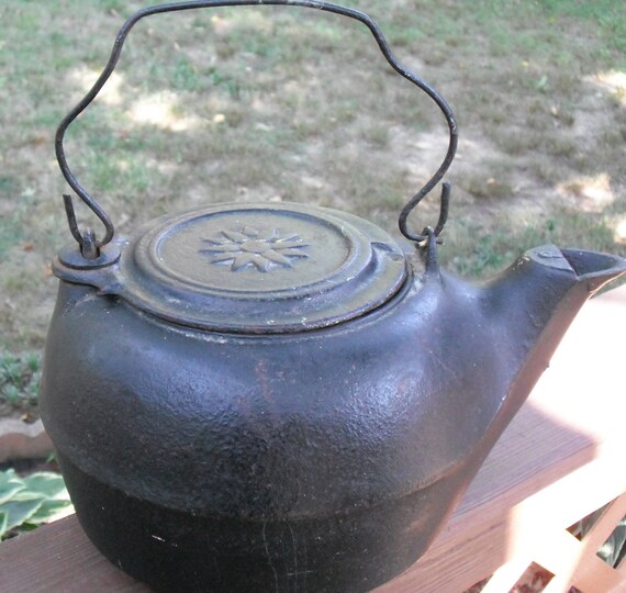 Heavy Black CAST IRON KETTLE with swing top and number 8 on