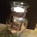 Old Vase With Lace and Candle Centerpiece