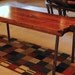 Metal leg coffee table, red/brown