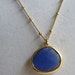 Ocean Royal Blue Faceted Jewel Necklace on Golden Saturn Chain. Sierra Leone.