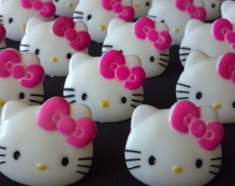 24 Hello Kitty face cupcake rings picks or cake toppers, perfect for your girly hot pink HK friendship cat birthday party treat bag favors