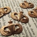 Vintage brass military stampings